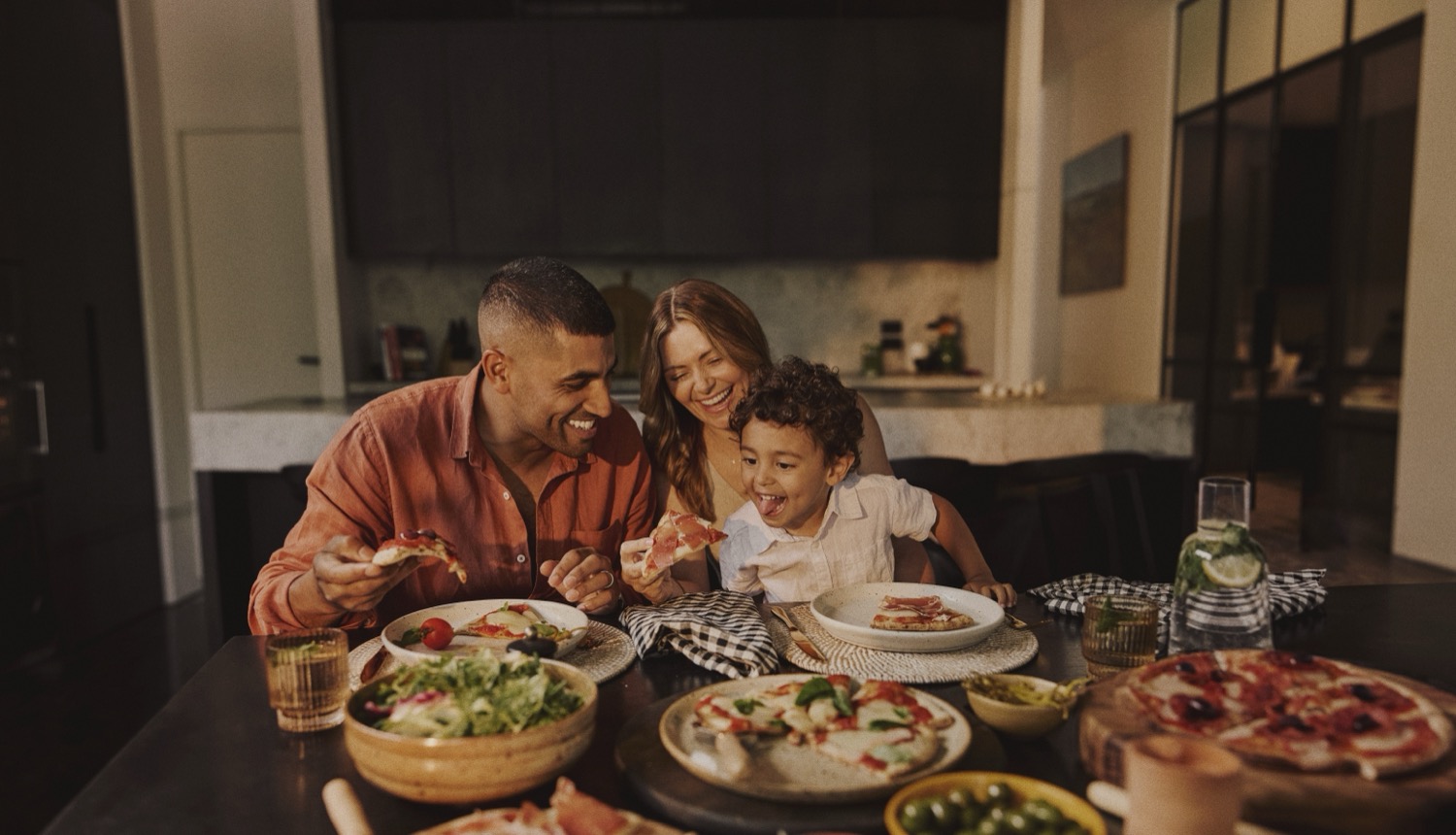 Family enjoying pizza night